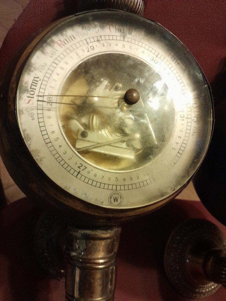 A German Brass-Mounted Clock and Barometer