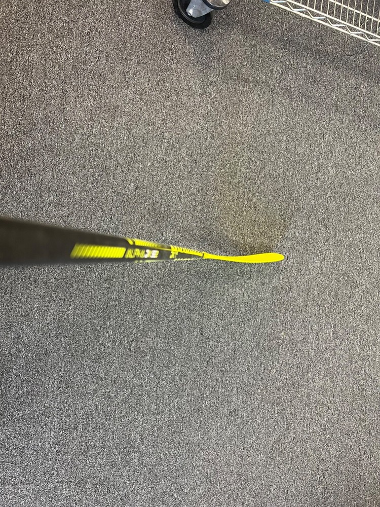 Warrior Alpha DX SE2 Grip Intermediate Composite Stick 55 FLEX