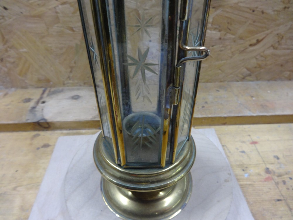 A Brass Candle Lamp.