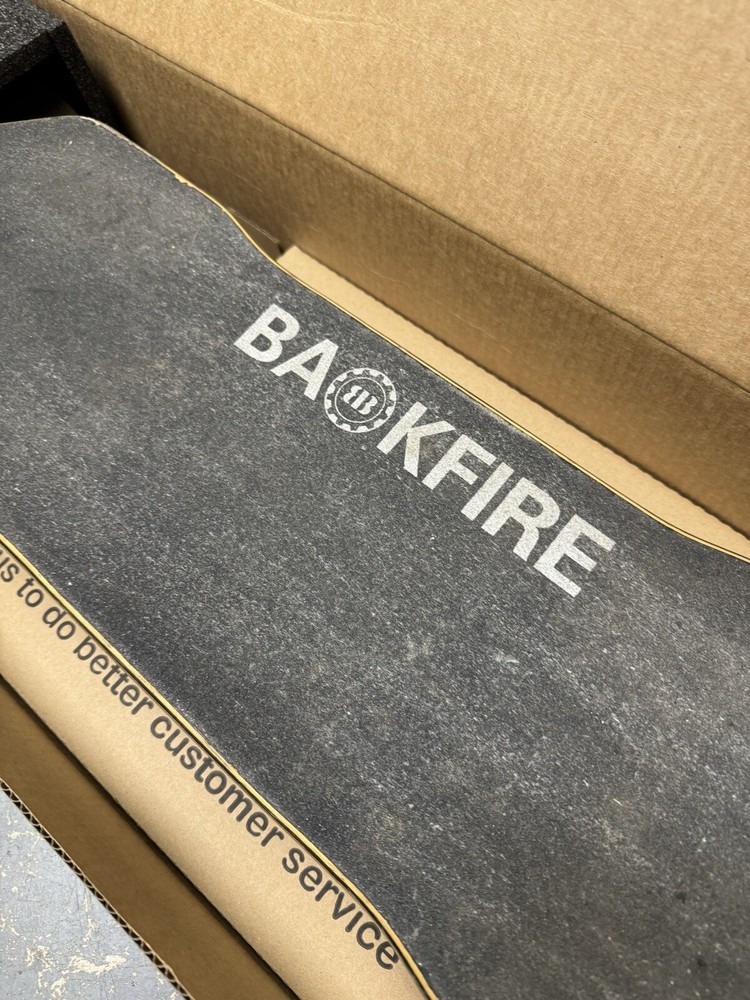 Backfire G2 Black Electric Skateboard With Extra Wheels, Charger & Remote
