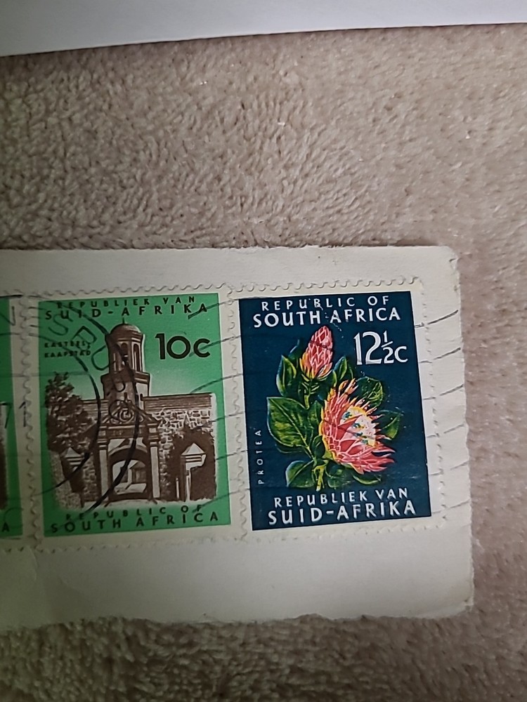 THREE SOUTH AFRICA STAMPS -(ENVELOPE AE)