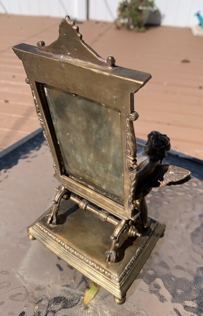ANTIQUE BRONZE TABLE MIRROR WITH CHERUB FIGURINE - 9 1/2" Tall
