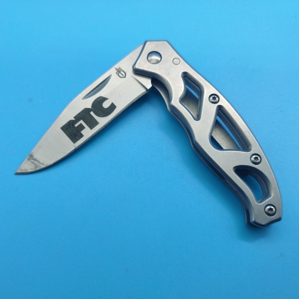 USED GERBER FOLDING PARAFRAME KNIFE SILVER BLADE