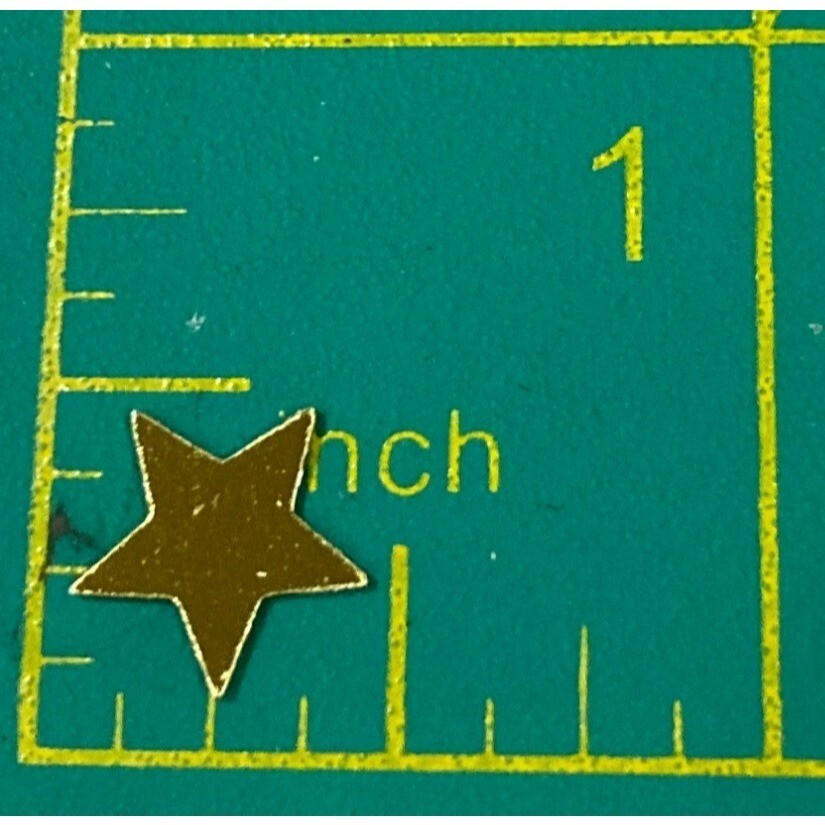 Metallic gold star glitter