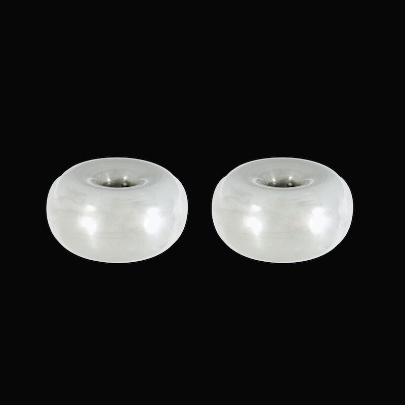 Hans Hansen. A pair of Sterling Silver Candlesticks. 1960s