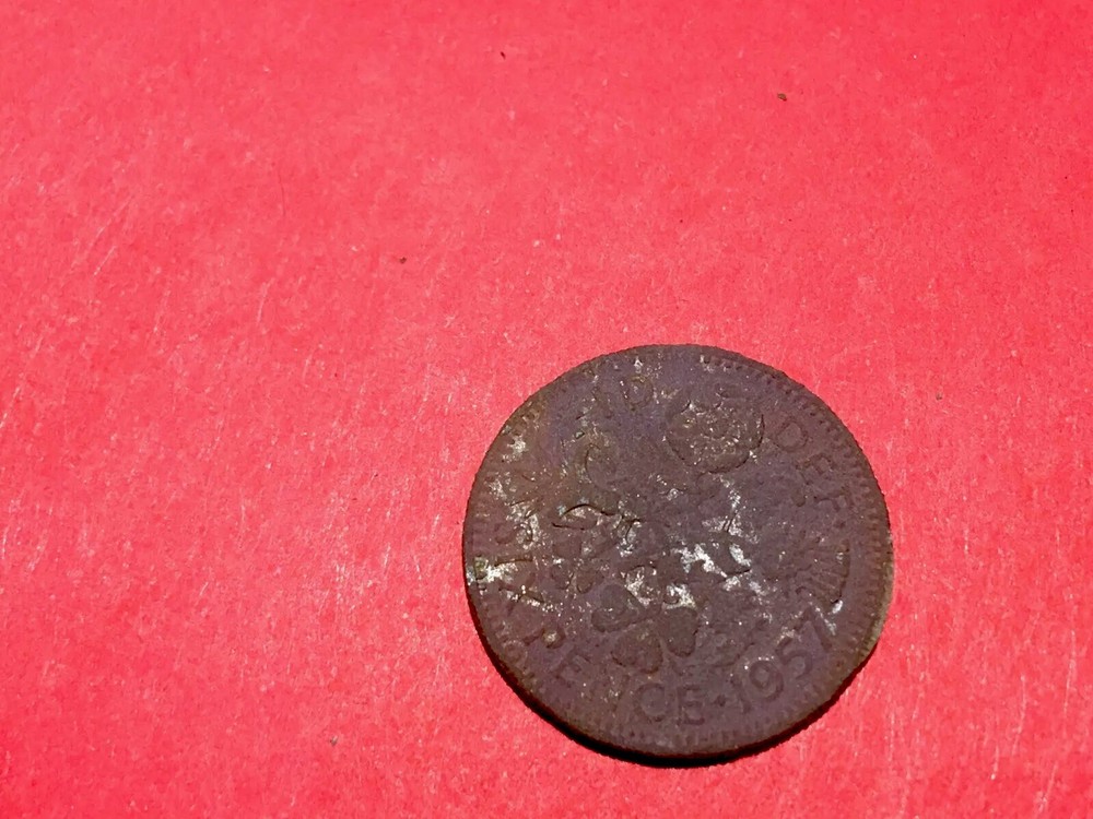 SIXPENCE 1957