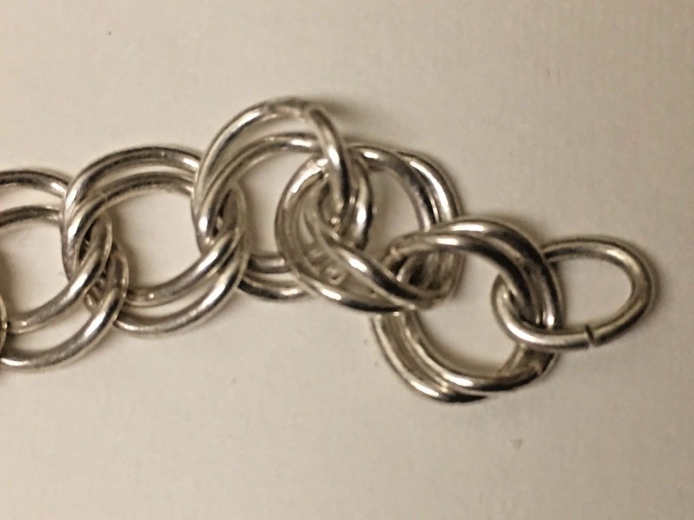 CHARM STERLING BRACLET 7 INCHES