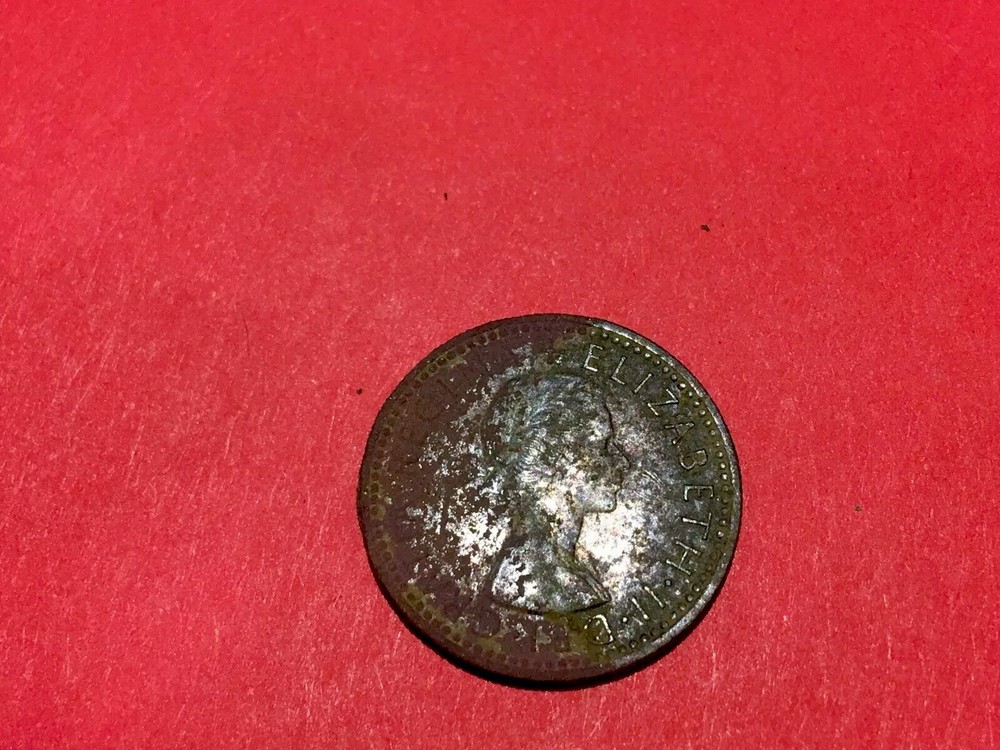 SIXPENCE 1957