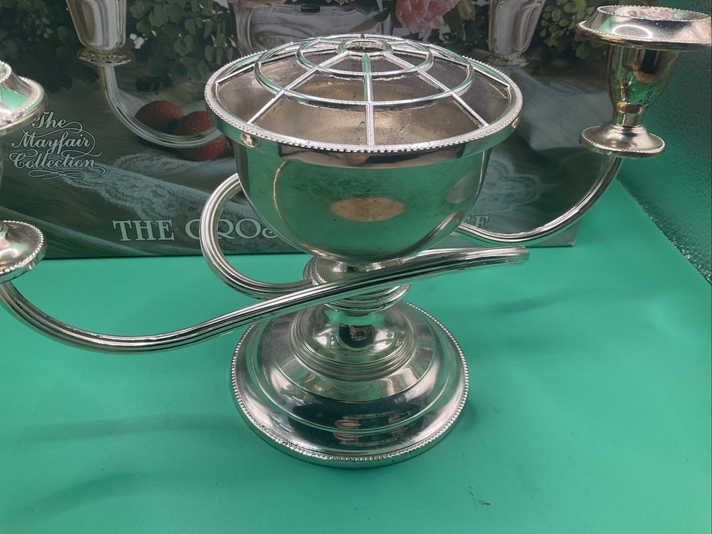 Good silver plated three armed Candelabra, made in England.