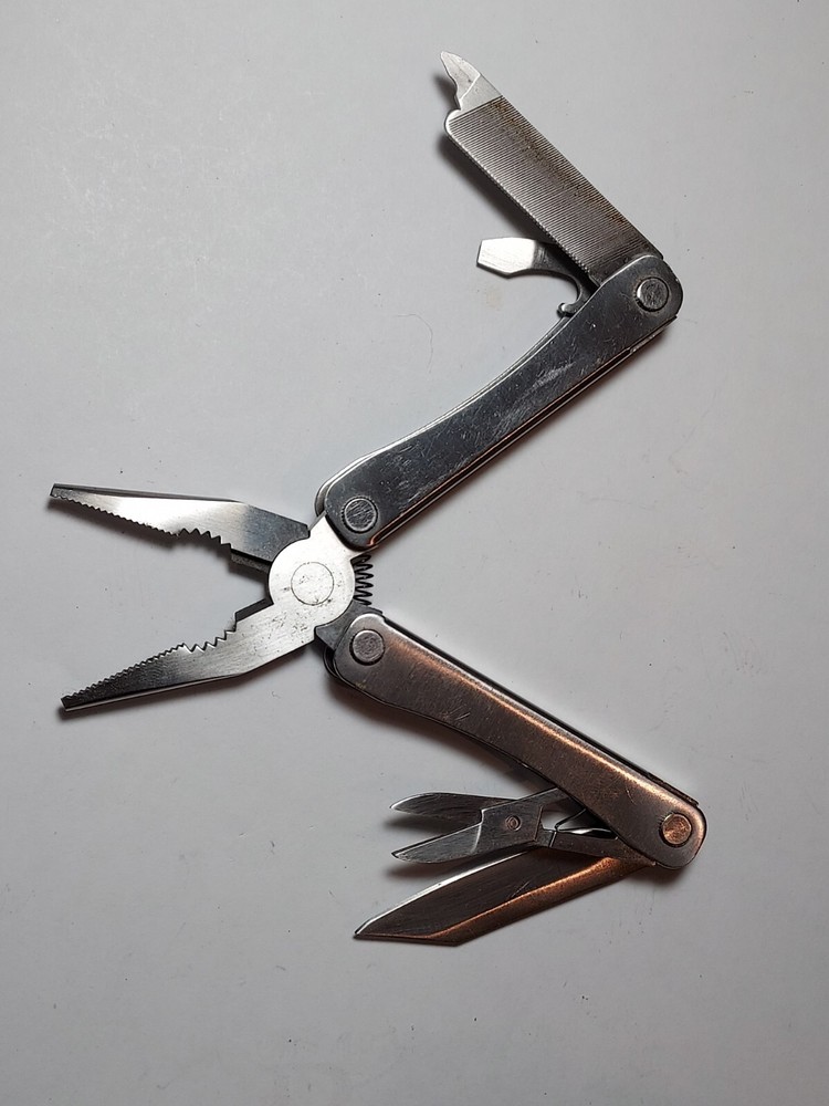 Stainless Steel Multi Tool advertising Rayovac