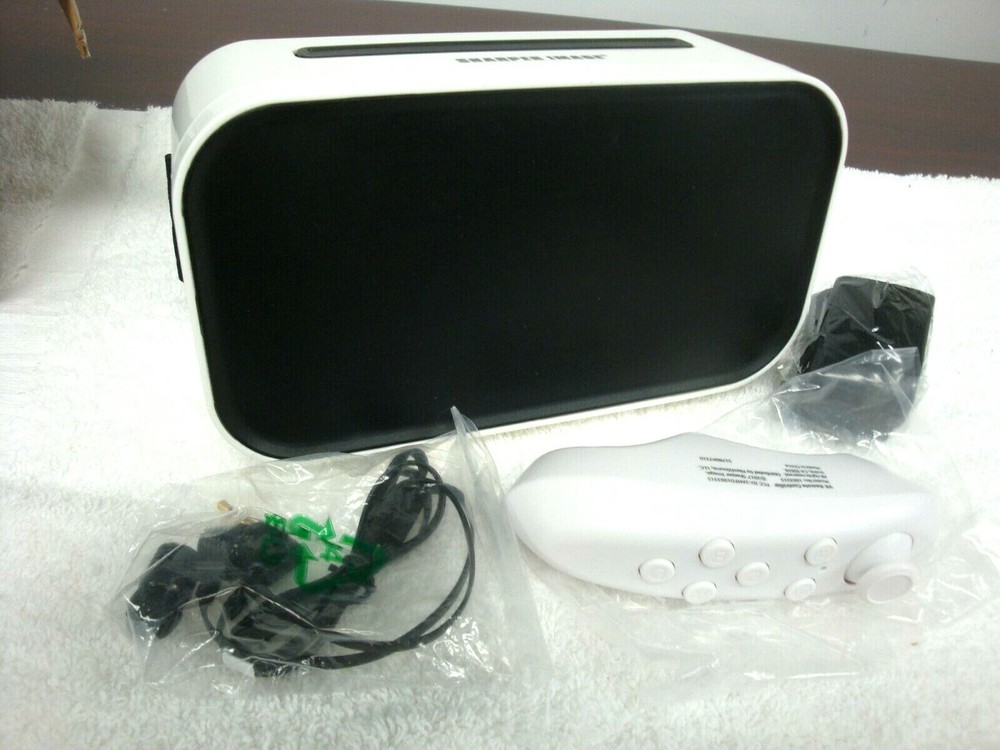 Sharper Image...Smart Phone 360deg Virtual Reality w/earbuds and controller