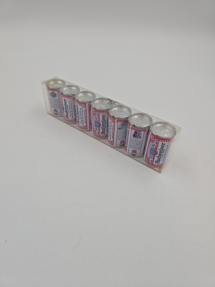7 Miniture Budweiser cans