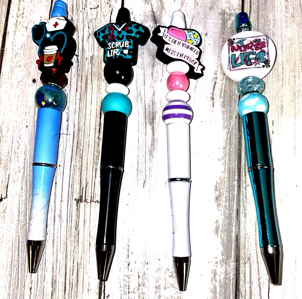 4 miscellaneous beaded pens with 1 ink refill each