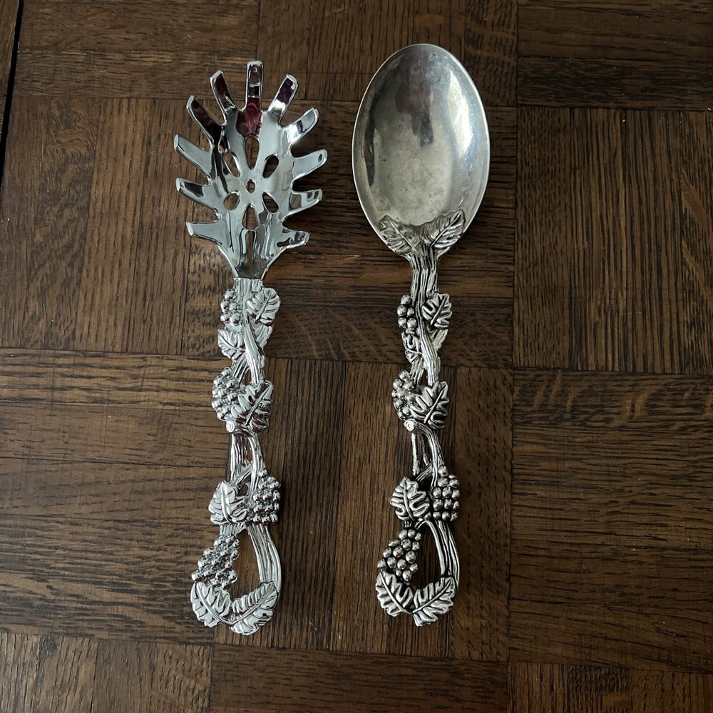Two ornate serving utensils