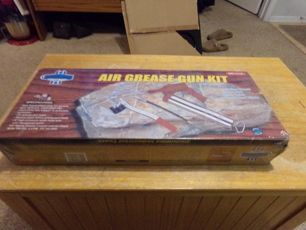 CUMMINS AIR POWERED GREASE GUN. OPEN BOX.
