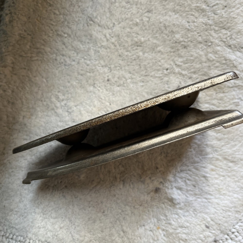 Vintage metal two level iron rest