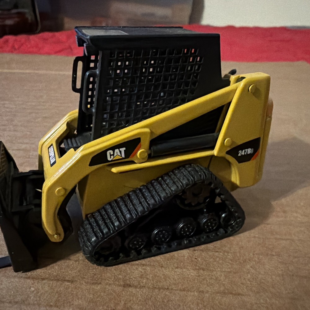 Norscot 55102 • Caterpillar • CAT 247 Multi Terrain Loader Work Tools 1:32 Scale