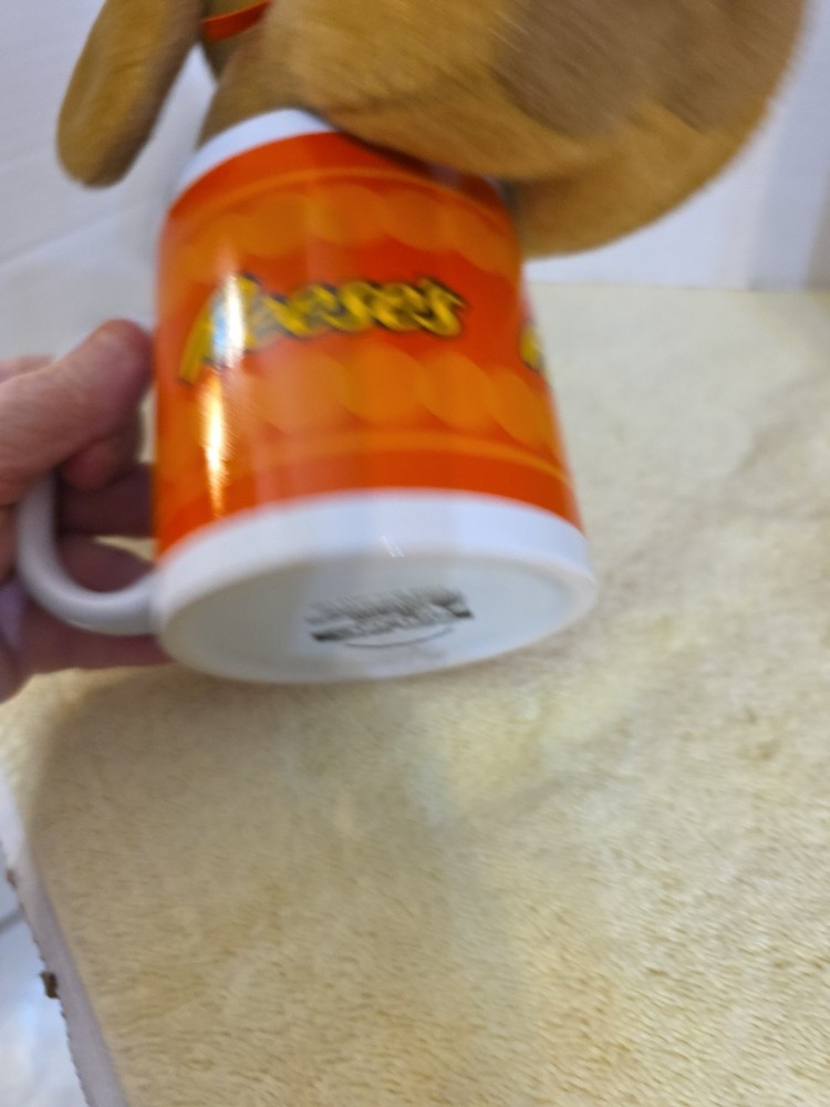 Reeses Pieces Coffee Cup With Plush Brown Dog