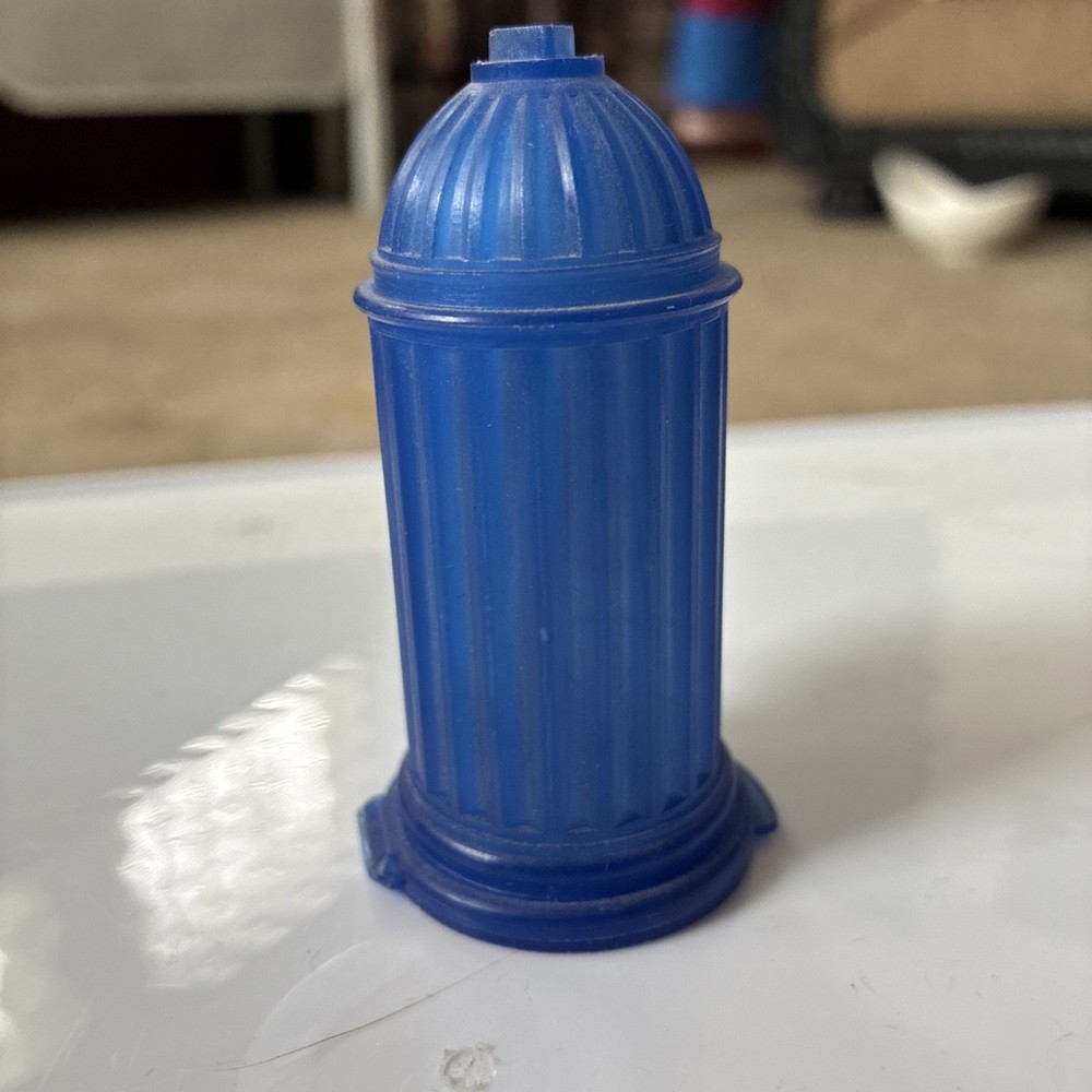 Vintage 70's Fleer Blue fire hydrant candy holder. 2.5 inches. Container empty.