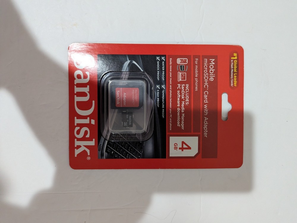 NEW SanDisk 4GB microSDHC Card with Adapter