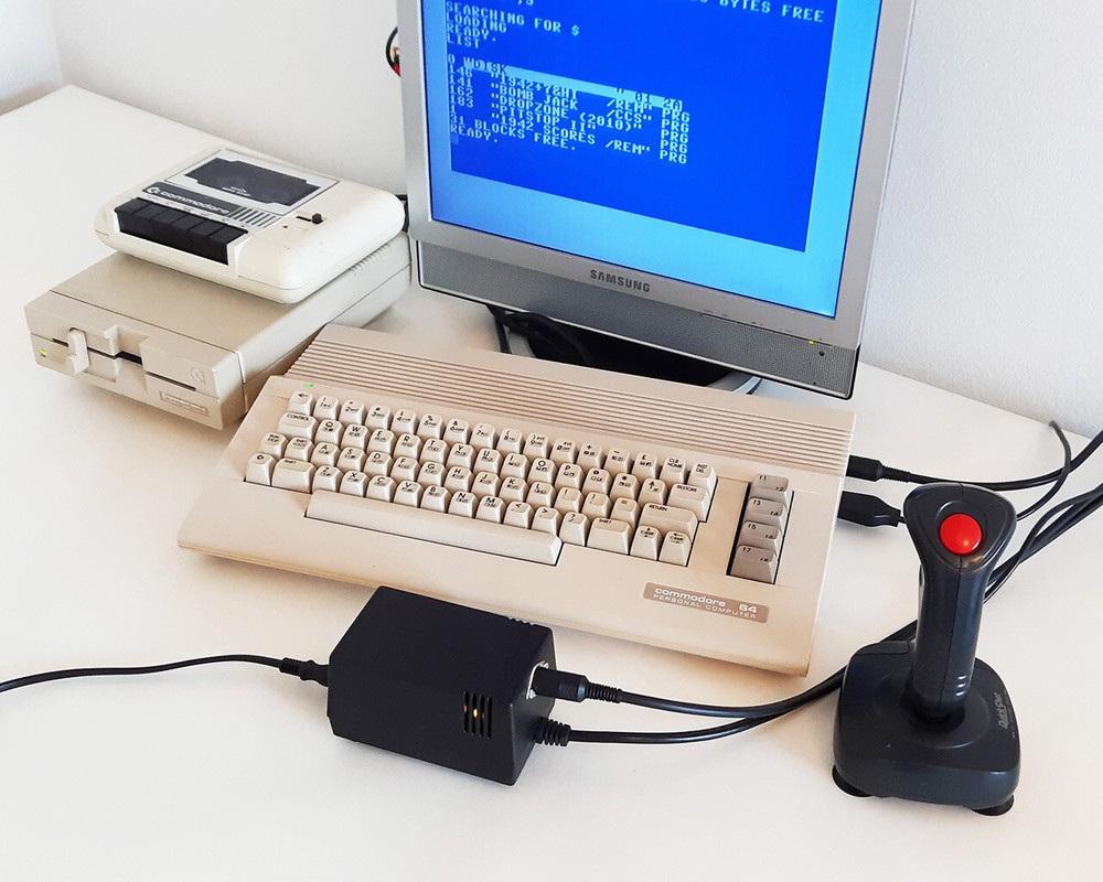 C128 PSU PRO 2-in-1: adjustable 5VDC output, FDD support.LED & SWITCH (US plug)