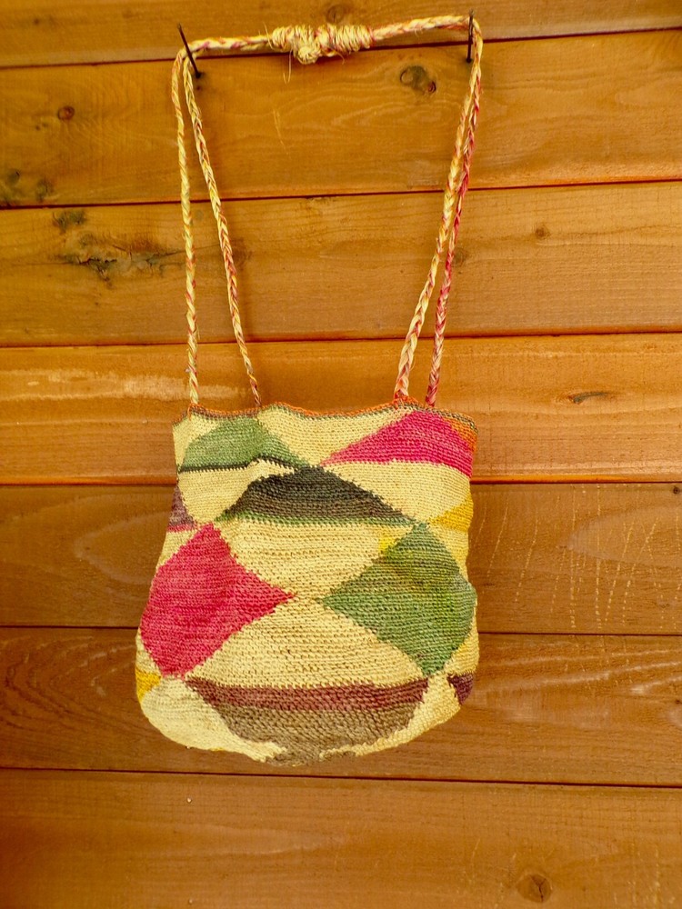 Basket from Ecuador multicolor on tan 1980's 8"tall handmade