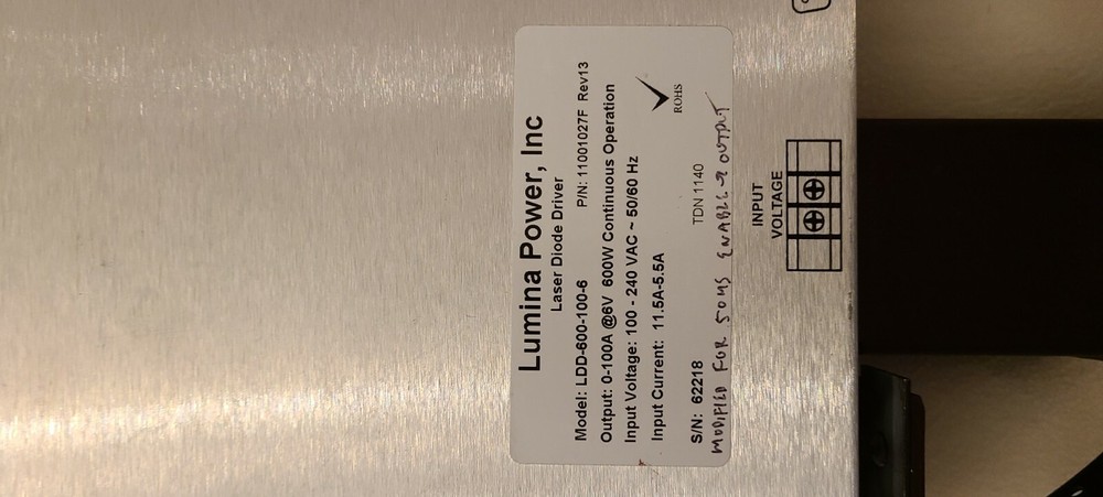 Coherent Laser Dilas with cooling block, interface unit and power supply.