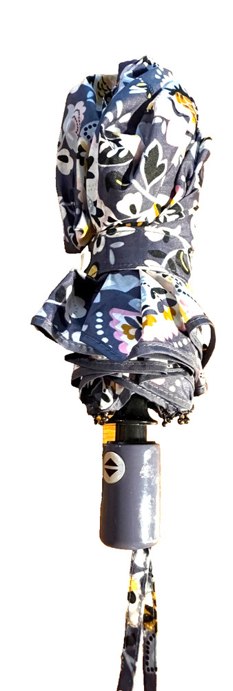Vera Bradley compact folding umbrella featuring a colorful floral pattern gray