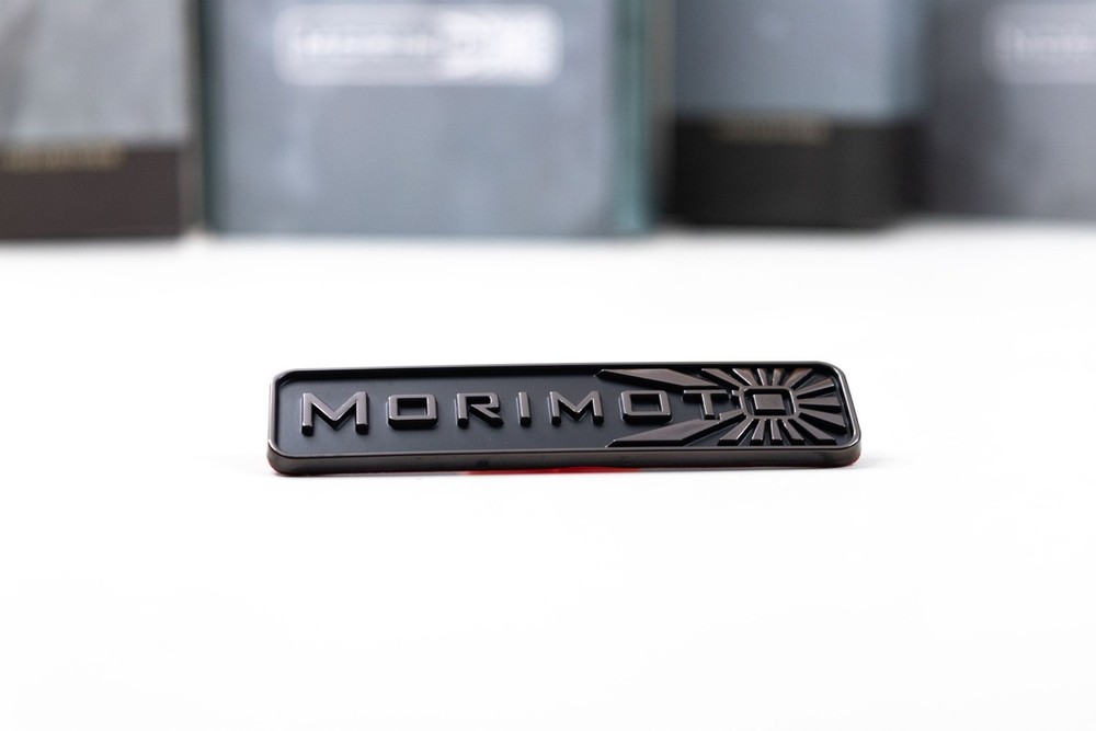 Morimoto Badge: (Black Chrome)