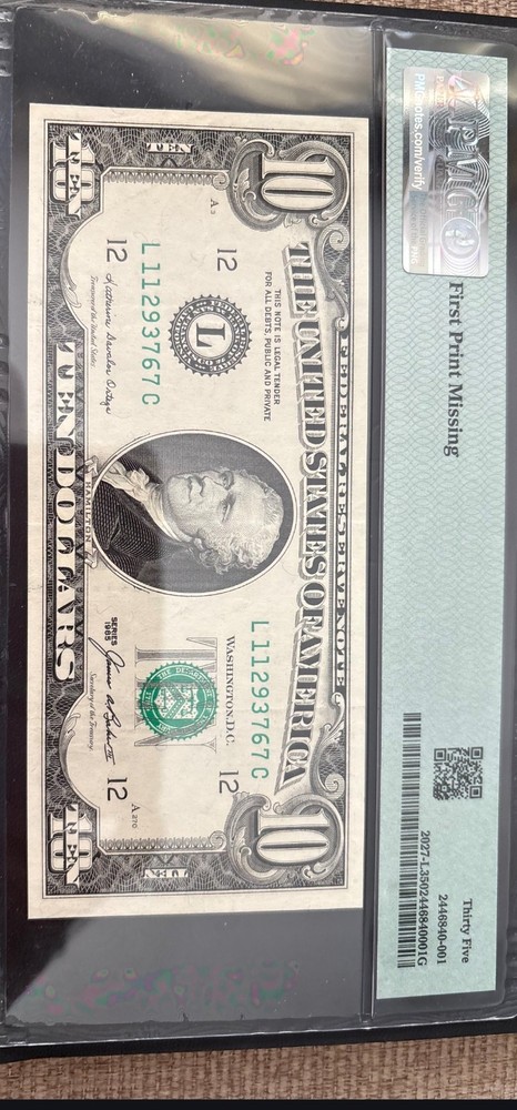 $10 1985 missing print graded 35