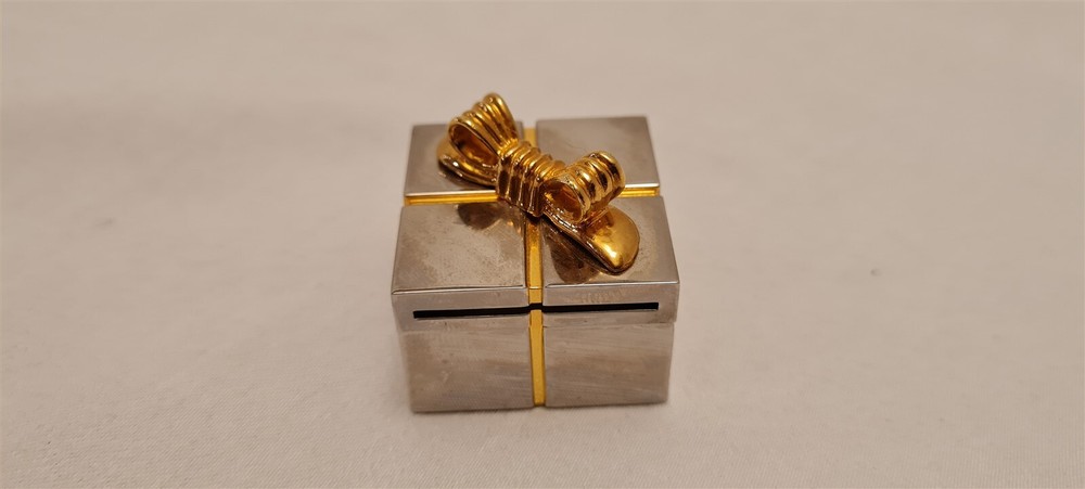 Gift mini clock with silver picture frame hidden inside gold trim