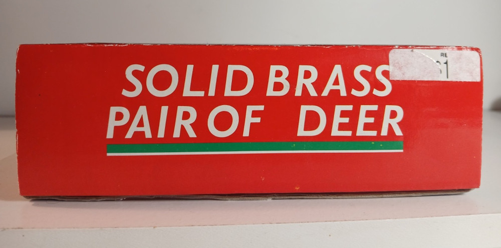 2 Solid Brass Deer. Distributed by Montgomery Ward.