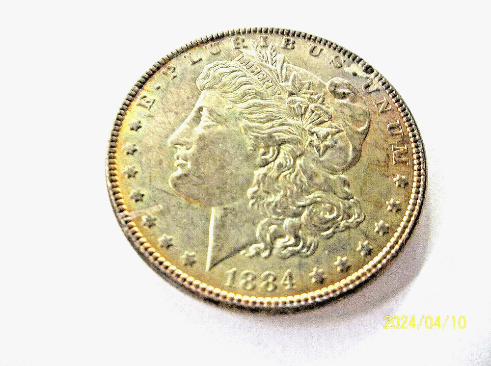 1884 P Morgan Silver Dollar BU with Awesome Toning