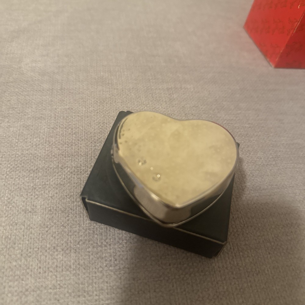 silver color pill box heart shape with leaf