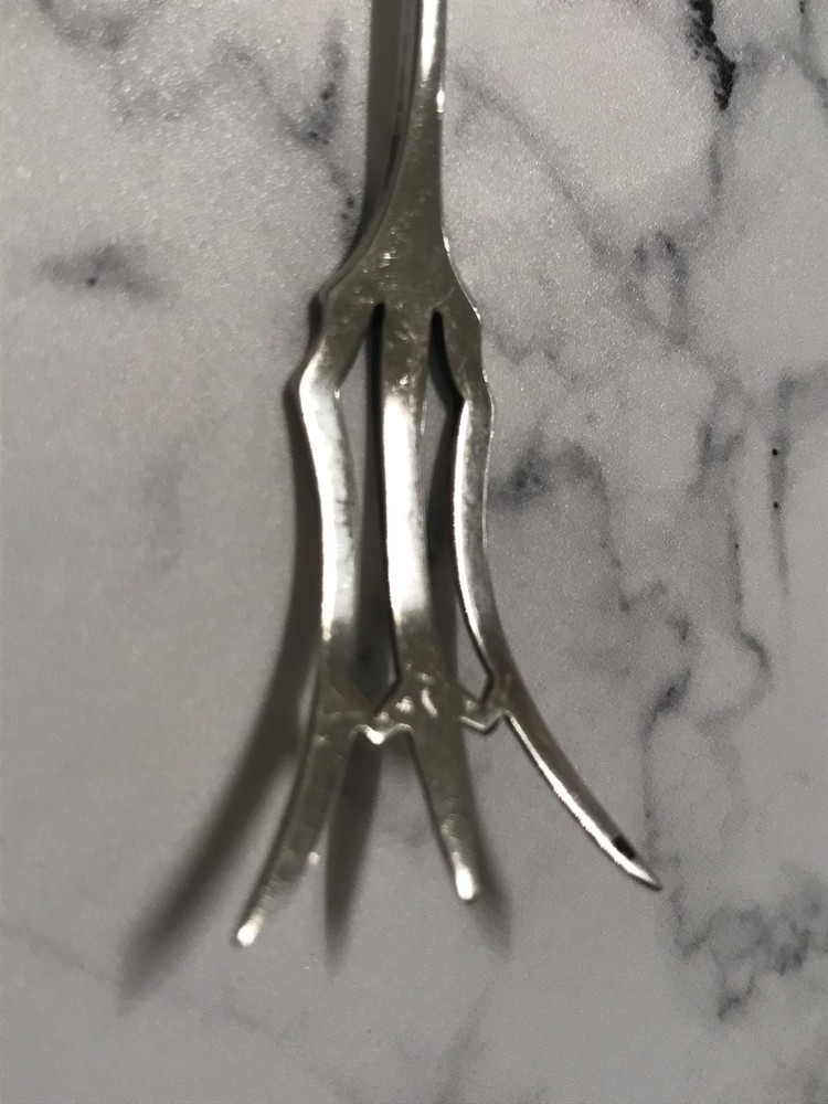 VINTAGE WEBSTER OPEN WORK OLIVE OR LEMON FORK