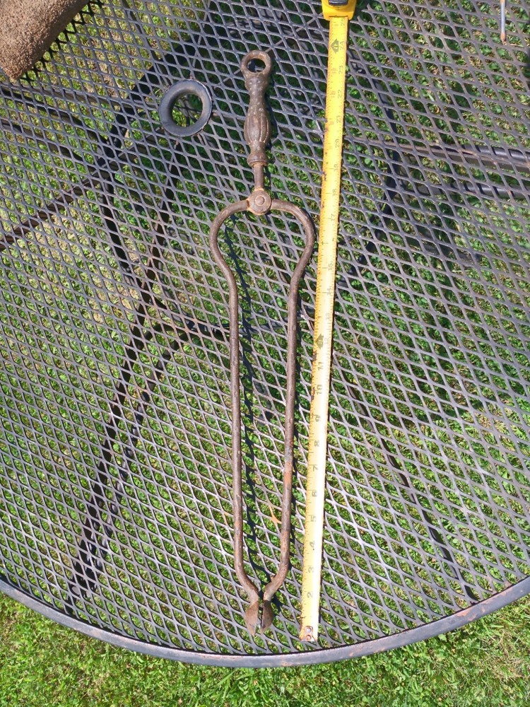 Antique fireplace tongs