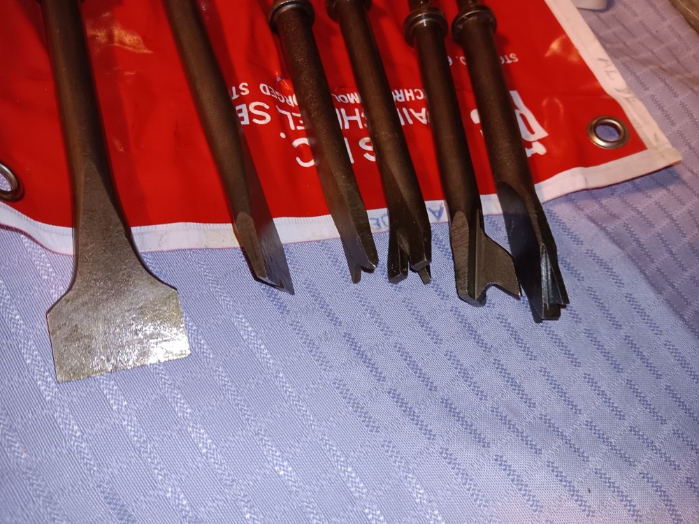 P t c six piece air chisel , set. Q Quick change.