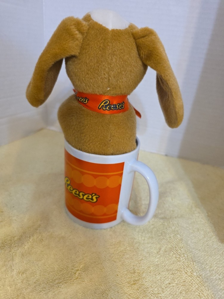 Reeses Pieces Coffee Cup With Plush Brown Dog