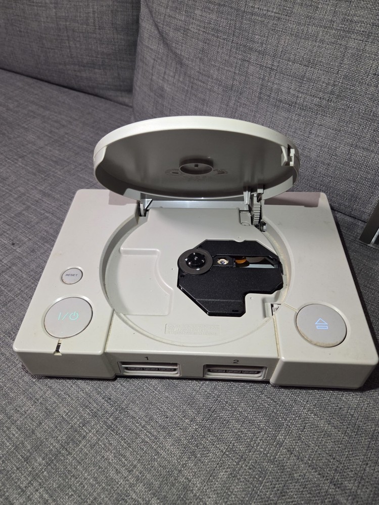 PS1 SCPH-9002 + Cables + Game (No Controller)