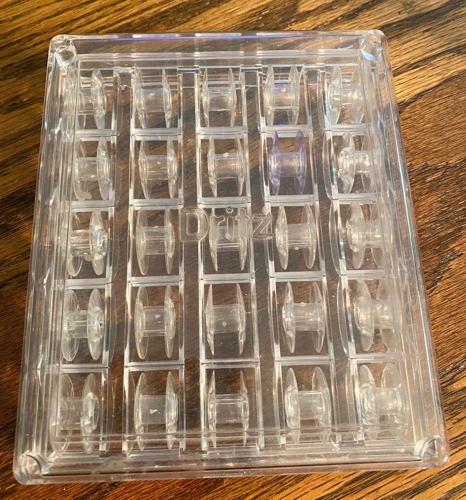 DRITZ  25 Plastic Bobbins in Case