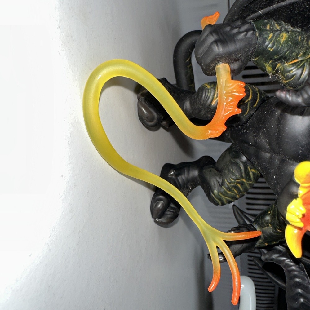 bobblehead demon with fire rope