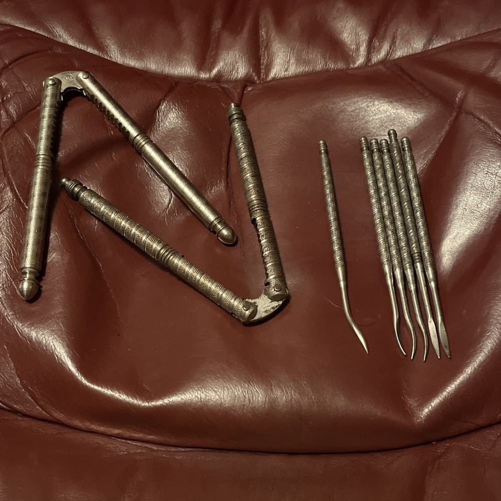 Silver Metal Vintage/Retro Nutcracker Set with 2 Nutcrackers and 6 Picks