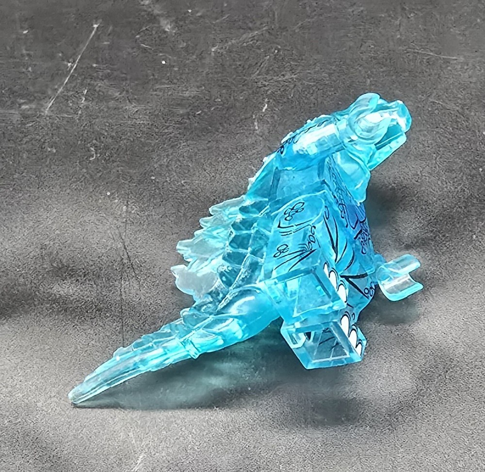 godzilla mini figure- trans neon blue ice with printed body definitions