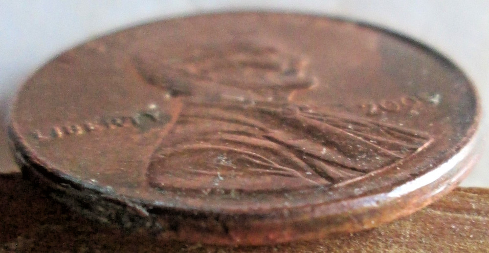 2005-P MEMORIAL CENT TILTED COLLAR STRIKE ERROR, MS-RED, CIRCULATED