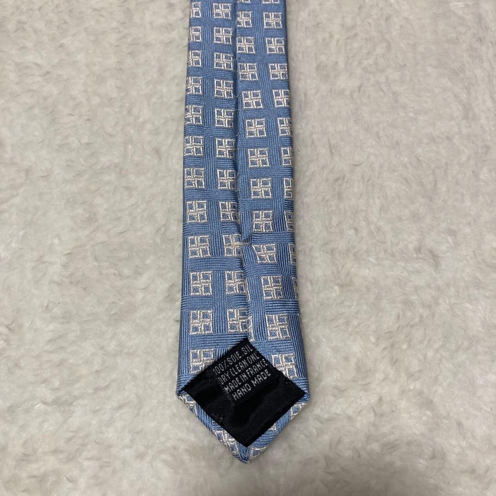 LANCEL PARIS Tie All over pattern 100% silk light blue