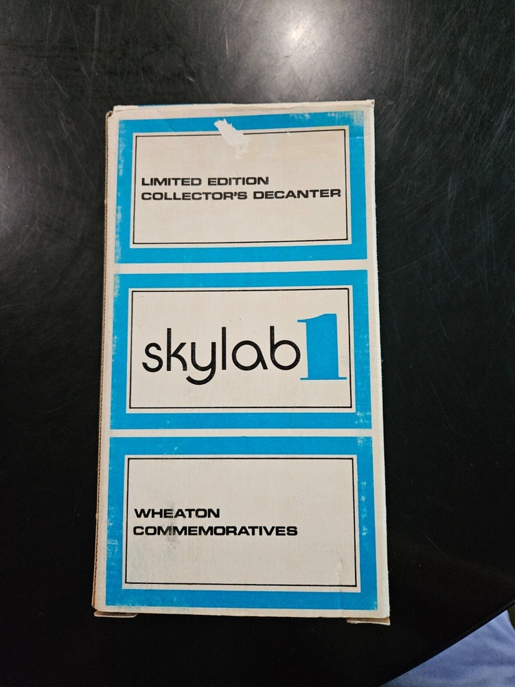 Sky Lab Weaton blue glass commemorative bottle