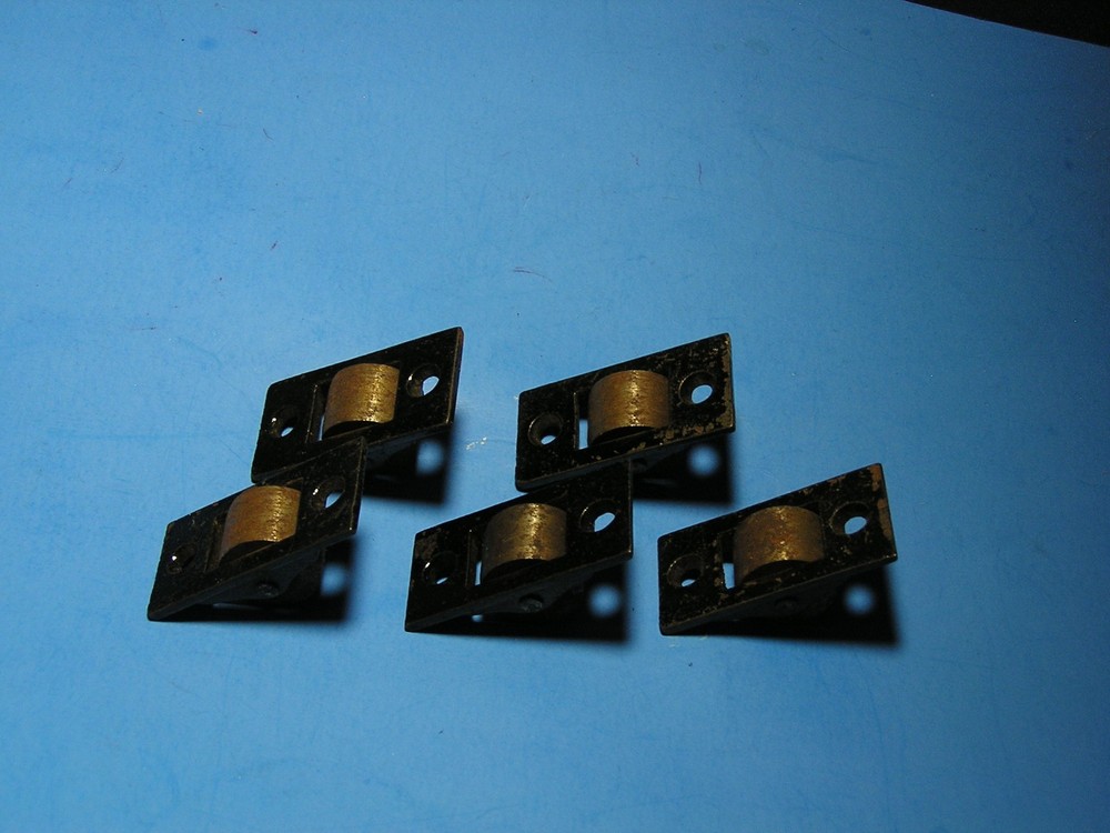 Vintage solid metal rollers for under furniture