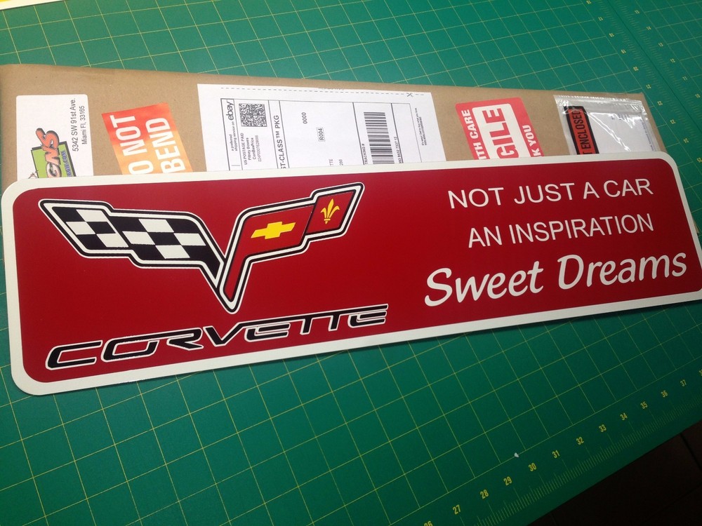 Red Corvette metal sign 6" x 24"