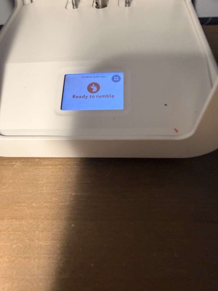 toybox 3d printer alpha 2 with power cable and accessories.