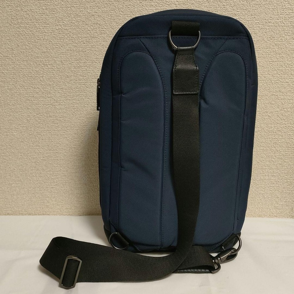 TUMI body bag slingback